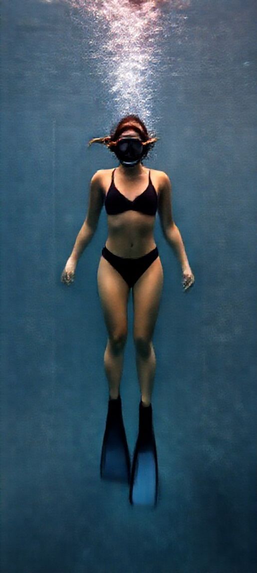 Enchanting Freediver Into Blue Photorealistic Wallpaper